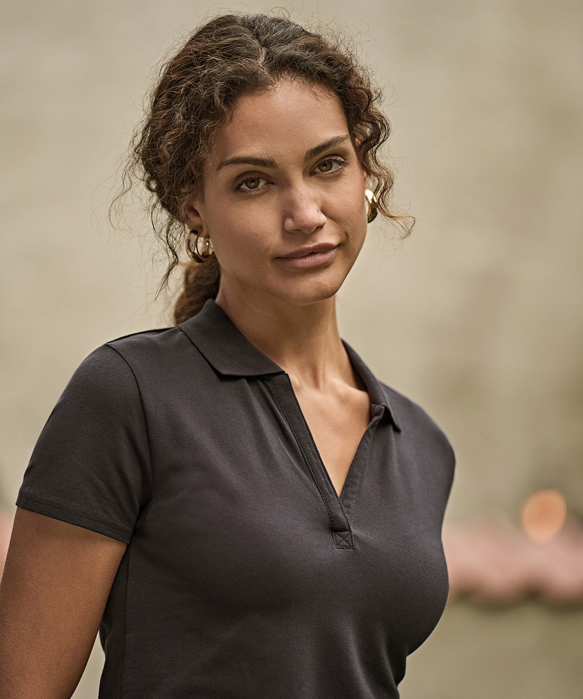 Women’s luxury stretch v-neck polo (1409) – lifestyle